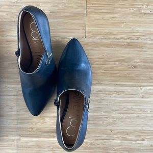 Calvin Klein, black shows size 6